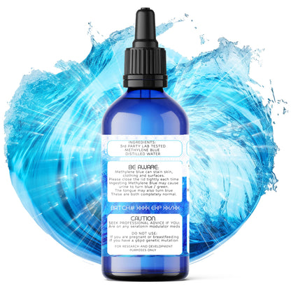 100ml Methylene Blue bottle angled right with bright blue elemental water background