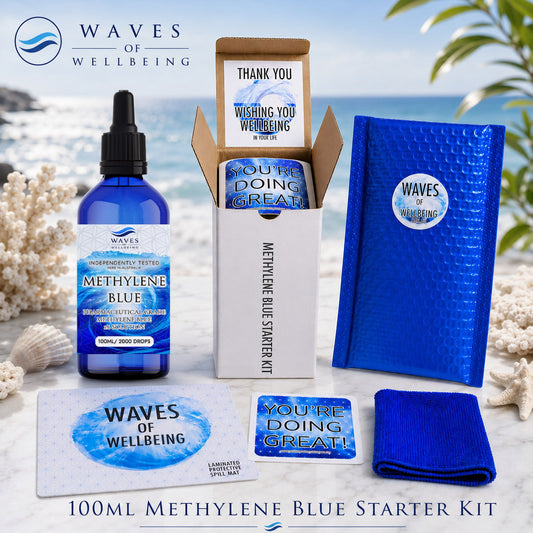 Waves of Wellbeing 100ml Methylene Blue Starter Kit on marble with coastal background